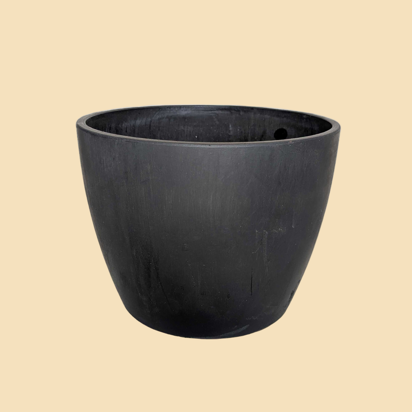 Black planter pot on a white background